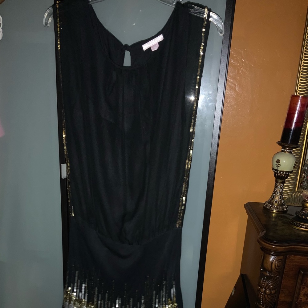 Black dress with glitter accent on bottom and side
